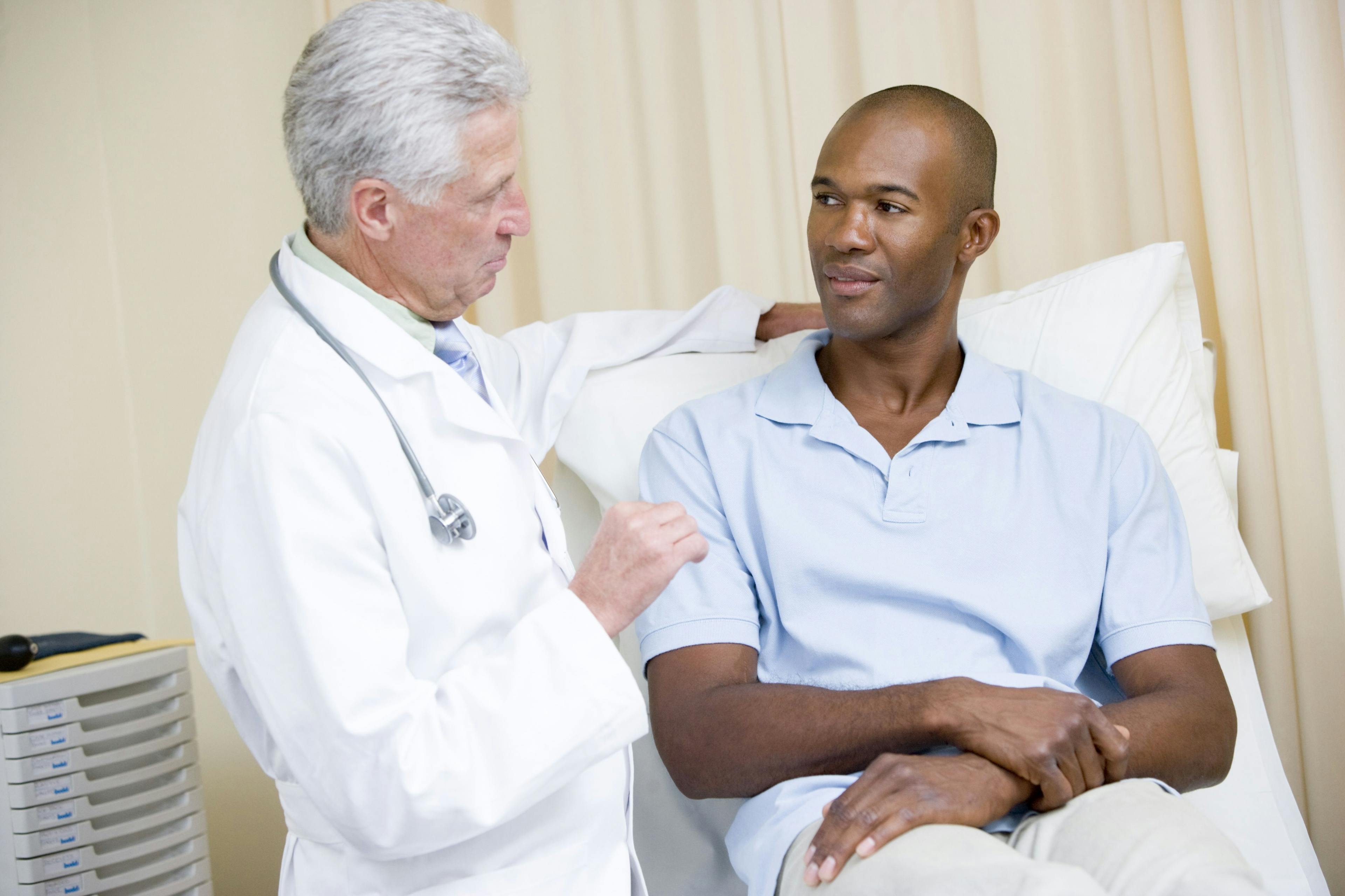 Healthcare provider speaking with a patient
