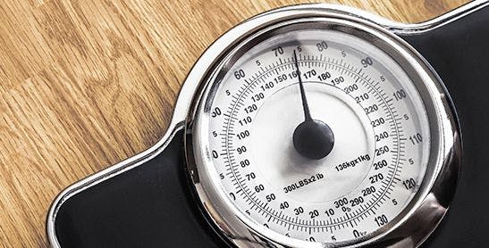 Stock art of weight loss imagery, including a scale.