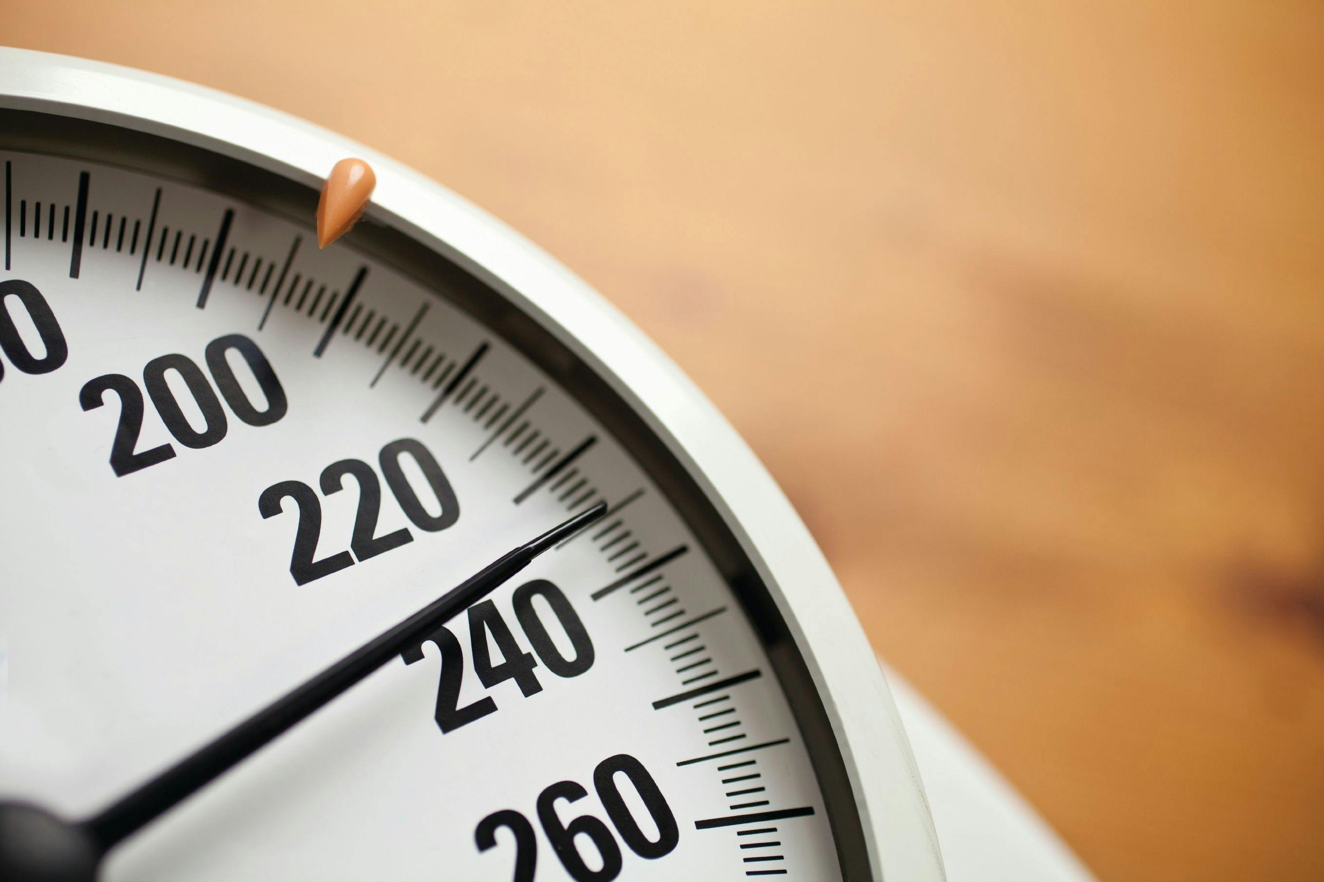 Close up of a scale depicting body weight. | Credit: iStock