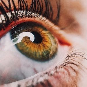 close-up of eyeball looking up | Credit: Unsplash/Perchek Industries