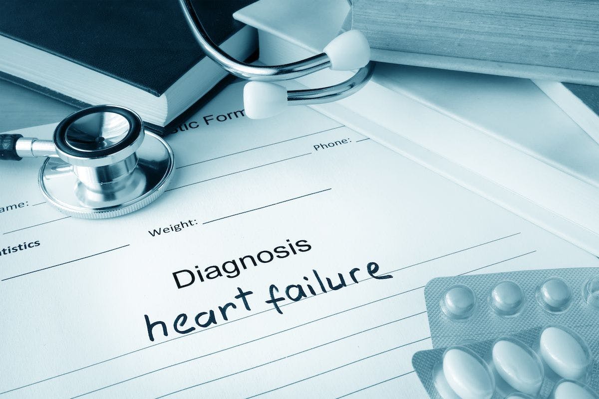 the words Heart Failure written on a doctor's note pad