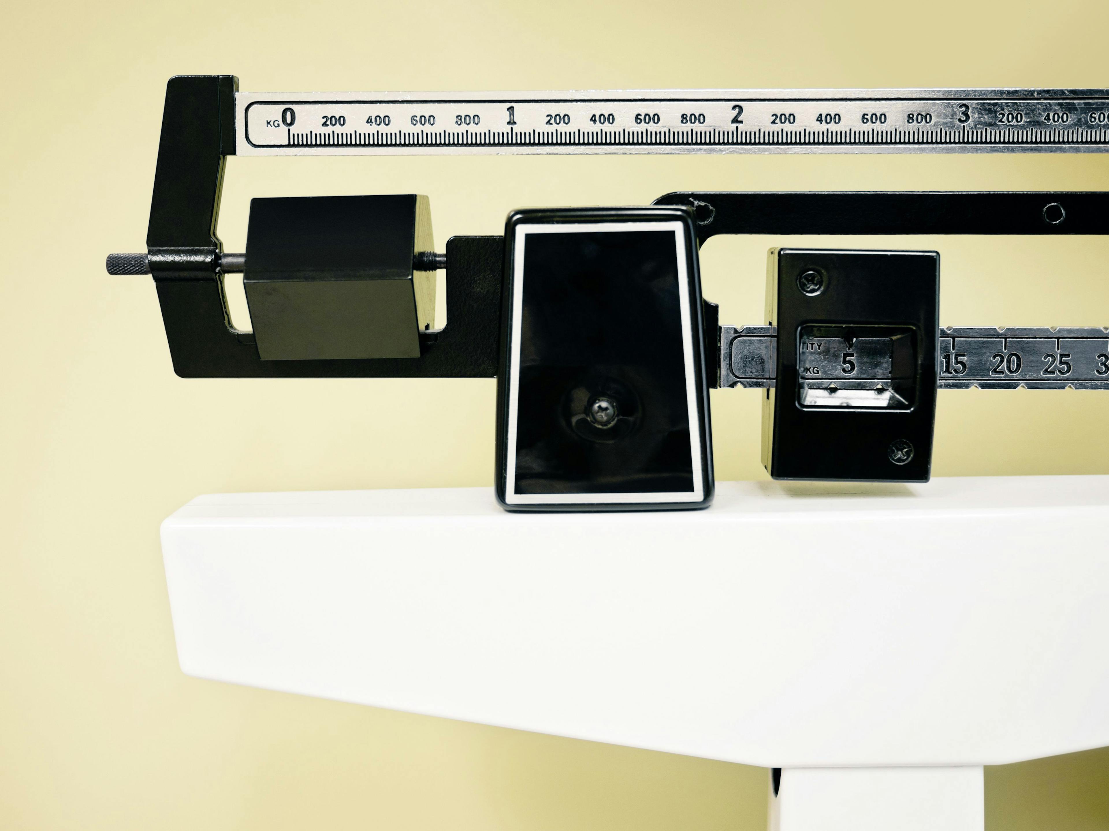 Close-up image of a mechanical physician scale | Credit: Fotolia