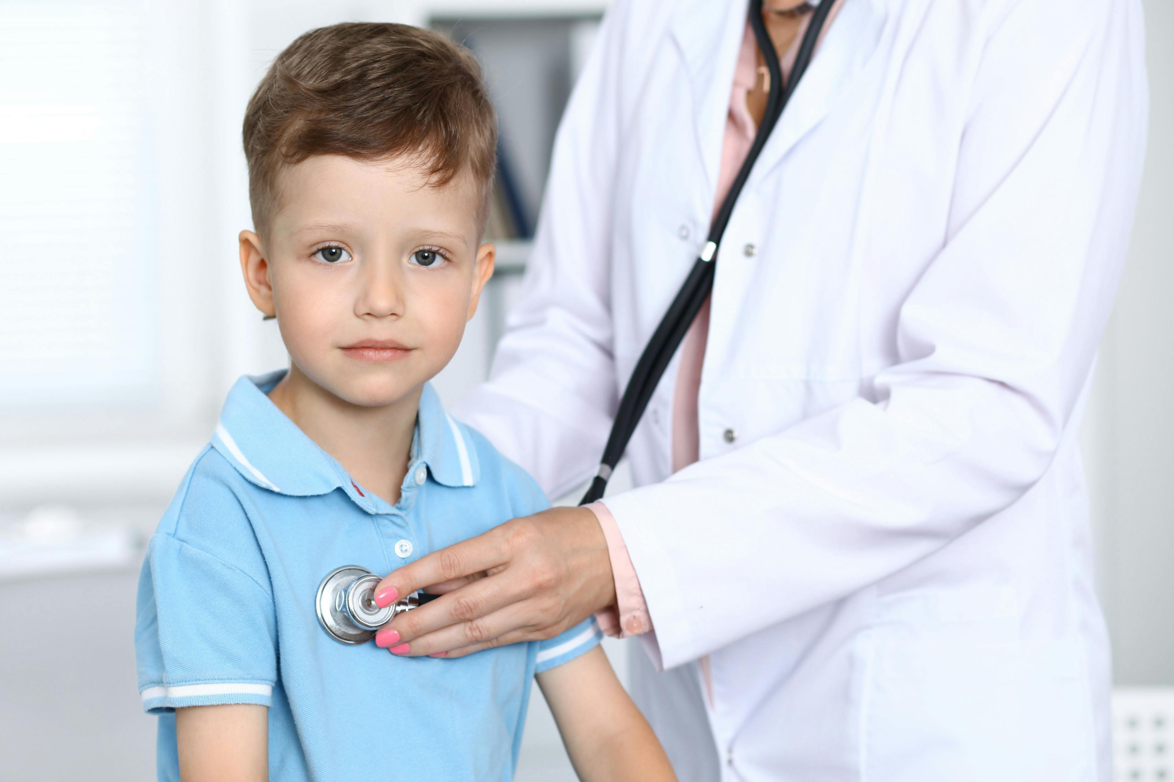 Doctor using a stethoscope during a pediatric examination