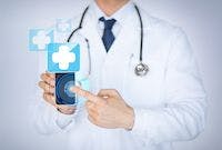 Doctor holding cell phone
