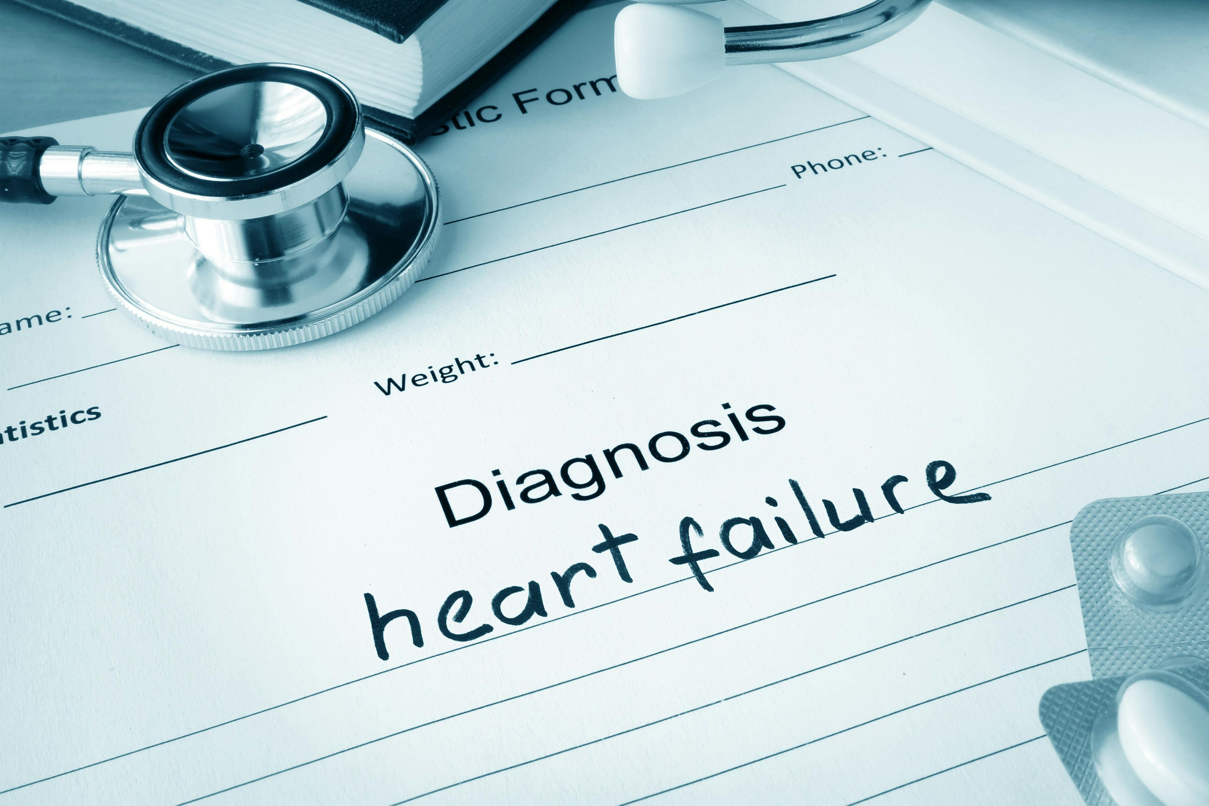 Heart failure stock image featuring doctor's note pad, medications, and medical equipment. | Credit: Fotolia
