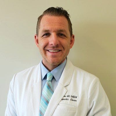 Headshot of Jesse Morse, MD, of the Orthopedic Center