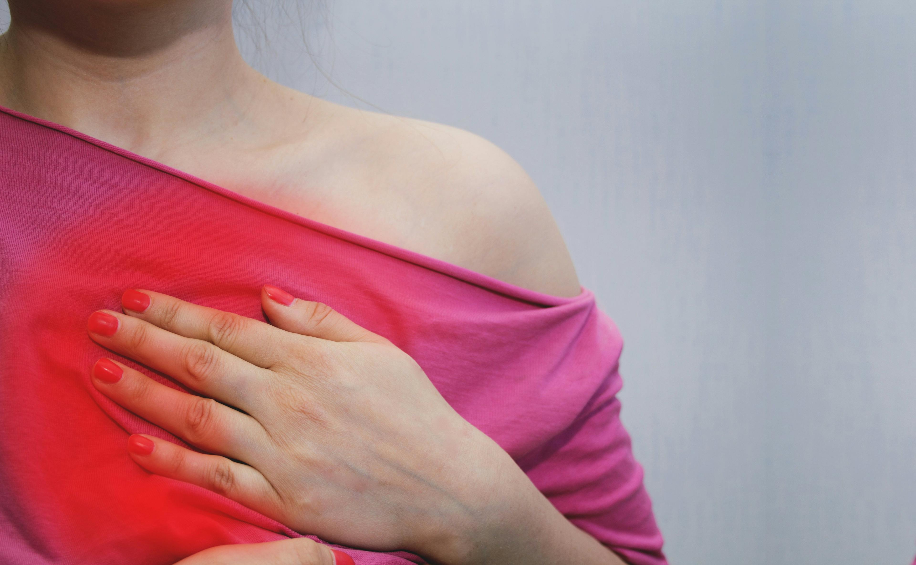 Woman with cardiovascular disease experiencing chest pain. | Credit: Adobe Stock