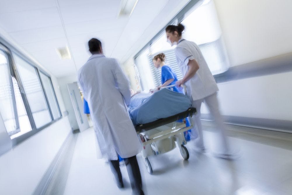 Doctors rushing in an emergency department