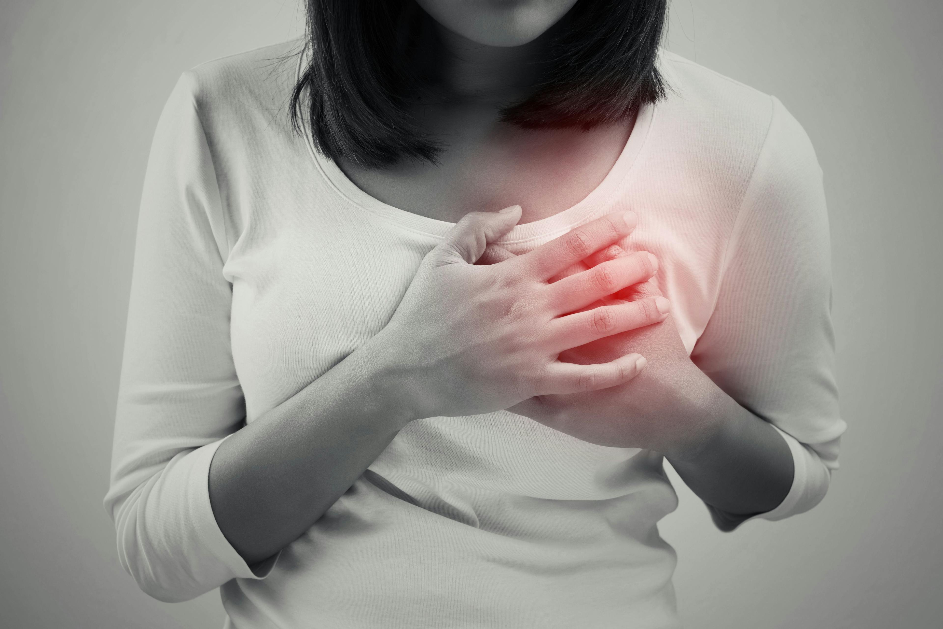 Woman experiencing chest pain. | Credit: Fotolia